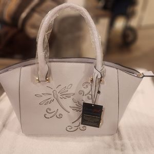 Dragon fly lavender purse.